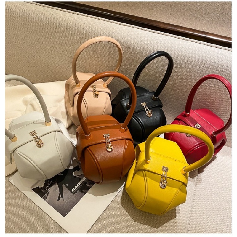     Круглая женская сумка-боч – обзор и цена Luxury Bags Sales