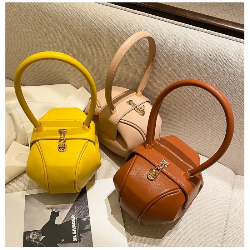     Круглая женская сумка-боч – обзор и цена Luxury Bags Sales