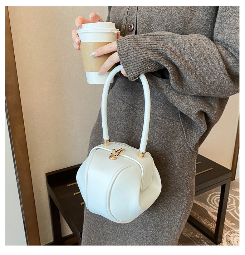     Круглая женская сумка-боч – обзор и цена Luxury Bags Sales